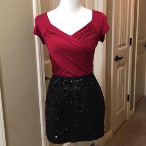 Black sequin mini skirt